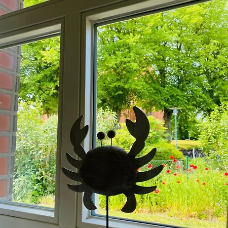 Апартаменты Unter Dem Reetdach Вустров